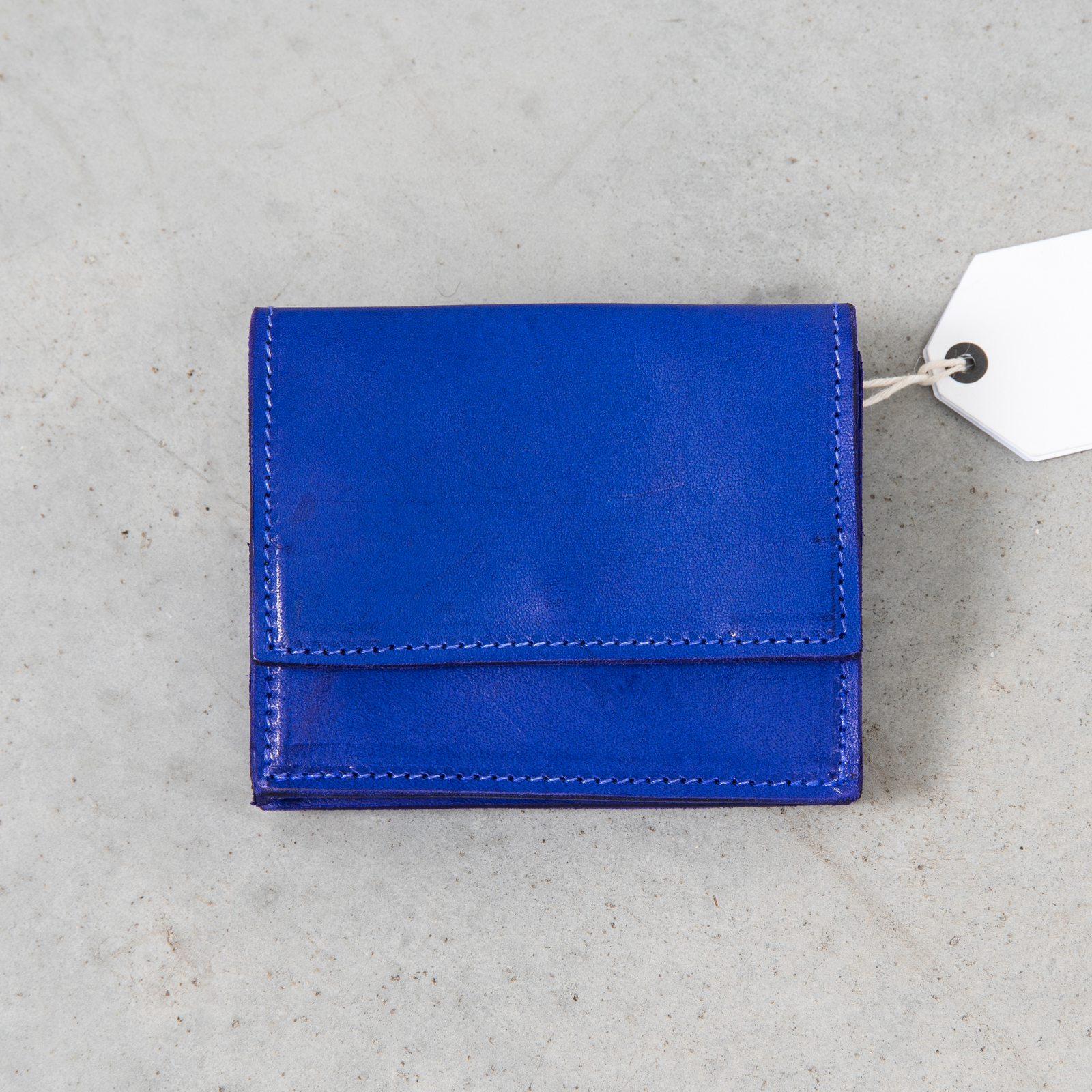 Cobalt blue bi-fold wallet with logo